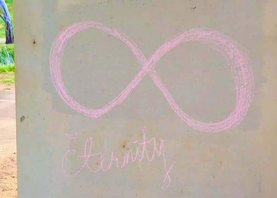 Example: Infinity maths symbol in chalk on pillar
