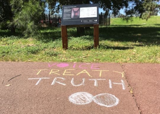Example: Infinity DOTS with words 'Voice, Treaty, Truth' in chalk